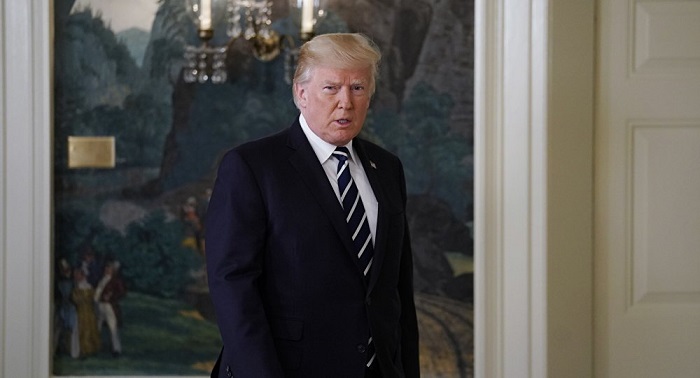 Trump decides to extend Iran sanctions relief