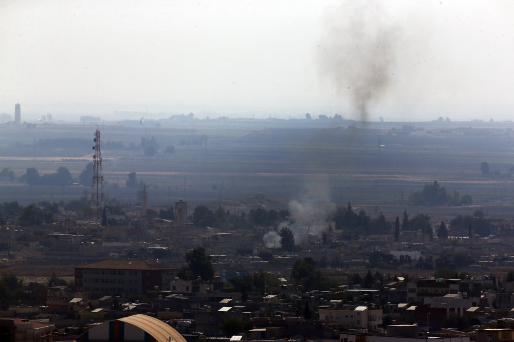 Fighting in Kurdish-held Syrian town despite cease-fire