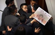 Chaos in Hong Kong chamber over violent attack on activist