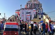 Iraqis defy crackdown to hold biggest protests yet