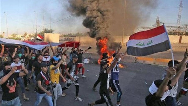 Iraq authorities open roads around Tahrir Square, call for peaceful protests