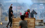 Iraqi forces push protesters back to main square, kill five