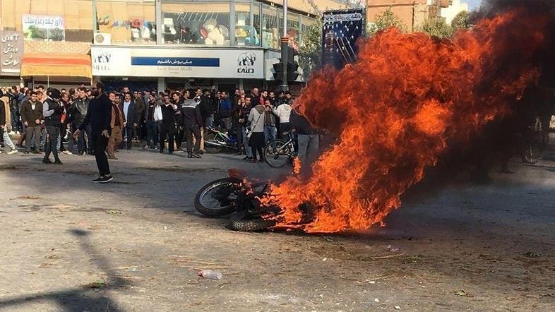 Hundreds of banks and government sites burned in Iran unrest