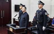 Former Interpol chief Meng Hongwei jailed for bribery