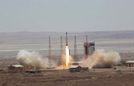 Iran says preparing site for satellite launch; US deems a cover up