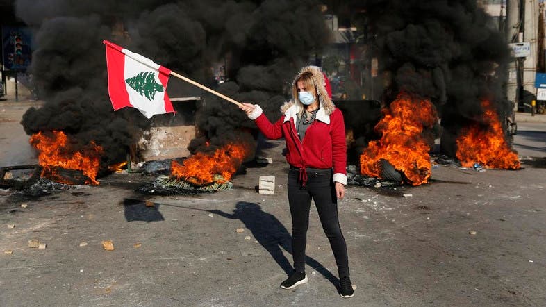 Lebanese block roads as protests enter fourth month