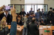 Russian anti-fascist group given 'monstrous' jail terms