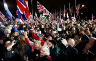 Flag-waving Britons stage noisy Brexit welcome outside parliament