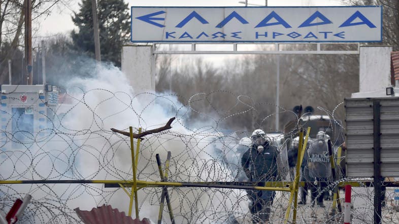 Clashes between migrants, Greek police erupt on Turkish border
