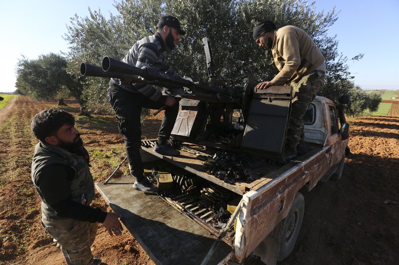Syrian opposition fighters retake key town