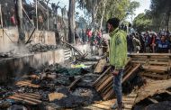 Child killed in Lesbos refugee camp fire