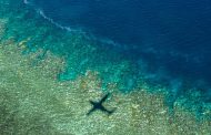 Great Barrier Reef watchers anxiously await evidence of coral bleaching from aerial surveys