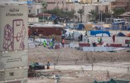 Despite coronavirus, it's 'business as usual' for World Cup workers in Qatar
