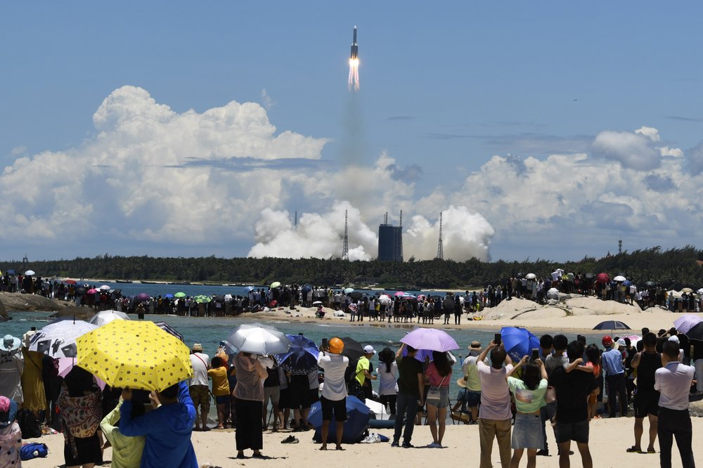 China launches ambitious attempt to land rover on Mars