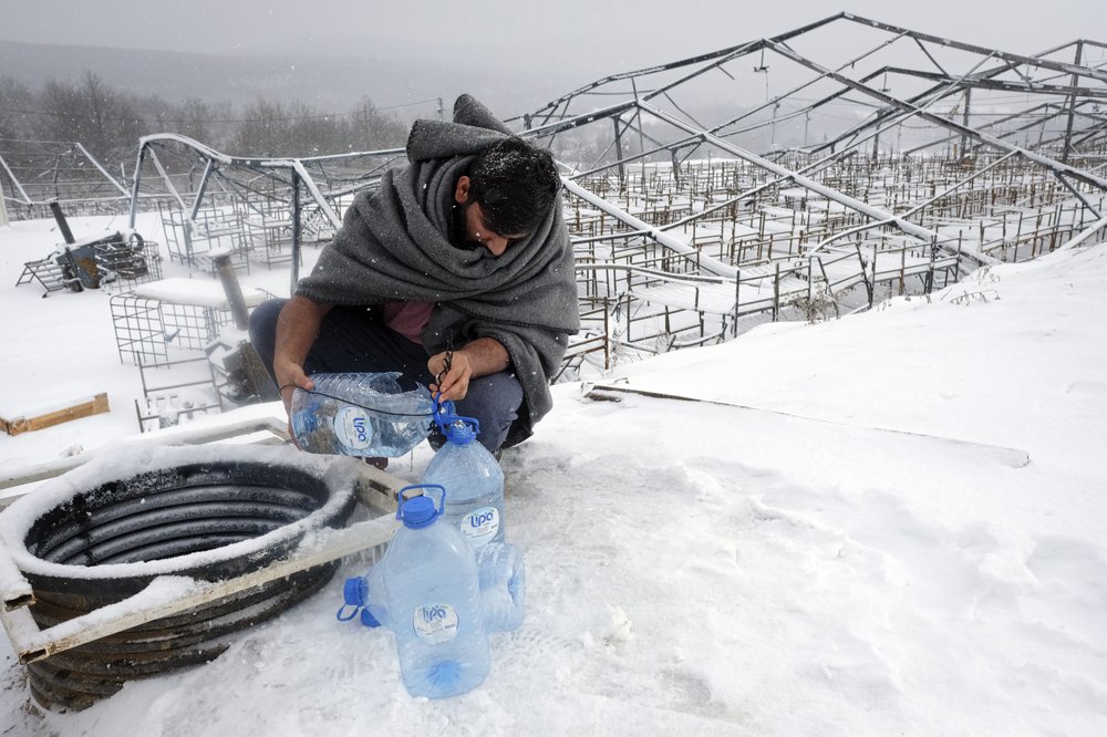 Migrants in Bosnia camp health checked after days in cold