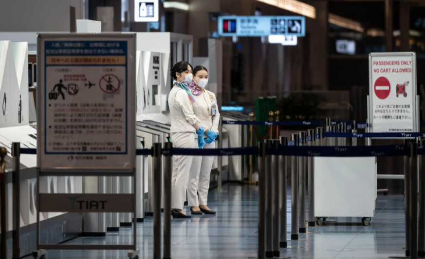 Japan bans all foreign travelers, and Australia delays its reopening.