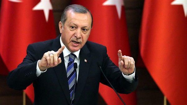 Erdogan threatens attack on Kurdish forces in Syria