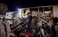 After deadly fire, Greece to move migrants from packed camps