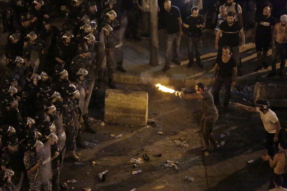 Lebanon paralyzed by nationwide protests over proposed taxes