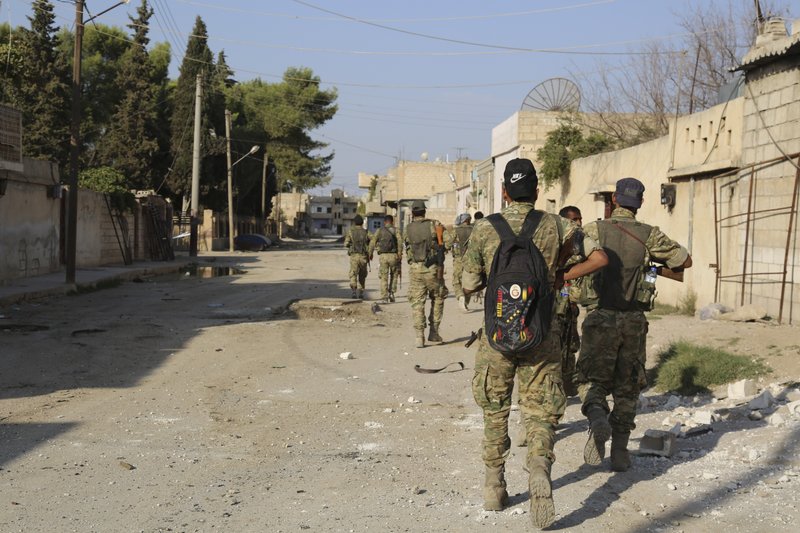 Germany’s Merkel urges Turkey to halt Syria push