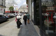 France's Macron reignites Muslim headscarf row  