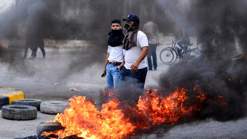 Iraqi officials: One protester killed amid ongoing clashes