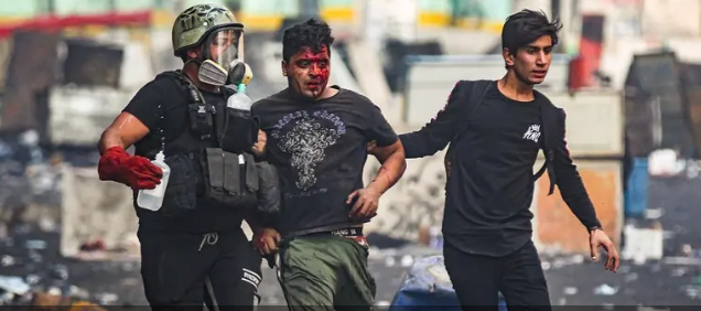 Four killed, scores wounded in Baghdad protests