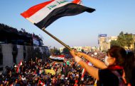 US urges early Iraq elections, halt to violence against protesters