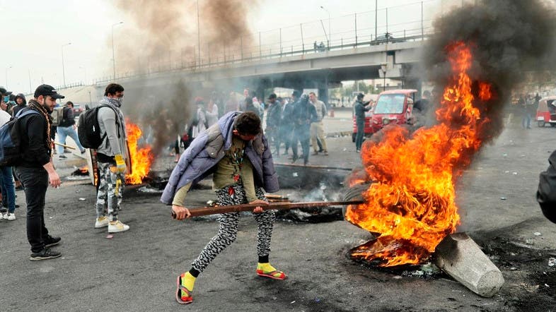 Iraqi protesters block main roads on day of deadline for government