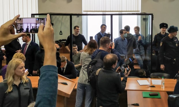 Russian anti-fascist group given 'monstrous' jail terms