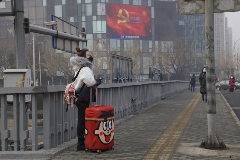 China reports spike in virus cases with new way of counting