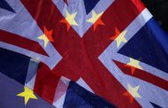 UK admits to breaking EU treaty as top legal official quits