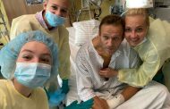 Navalny says 'able to breathe' unaided after suspected poisoning