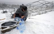 Migrants in Bosnia camp health checked after days in cold