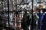 The Latest: Pakistan imposes partial lockdown in some areas