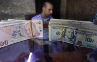 Turkish lira falls in volatile trading after central bank chief replaced