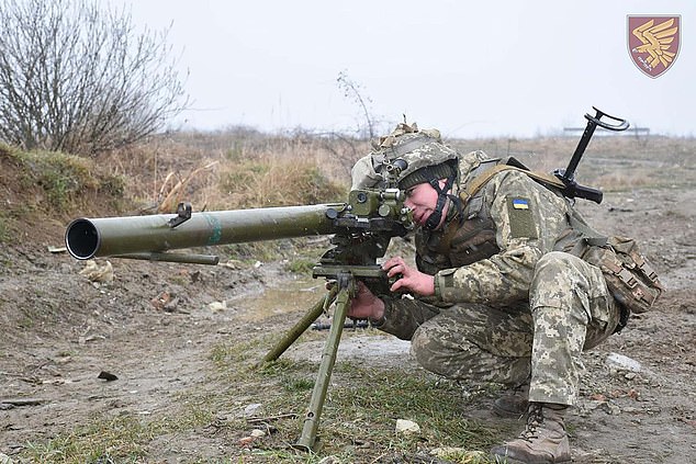 Ukraine crisis is 'one step from war': Russian state media ramp up rhetoric as former US ambassador to Moscow warns Putin could spark large-scale conflict in Europe as he tests Joe Biden by massing troops on border