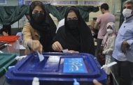 Iran votes in presidential poll tipped in hard-liner’s favor