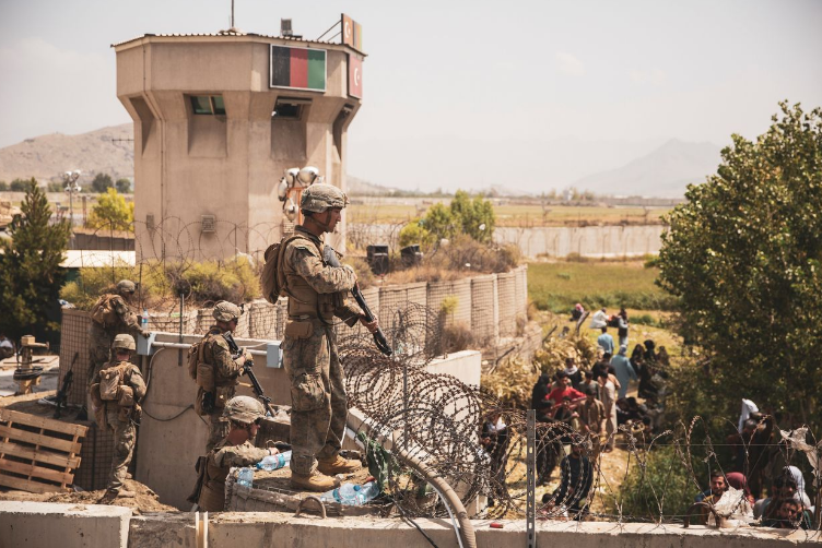 Afghan Crowds Fleeing Taliban Face Tear Gas at Kabul Airport