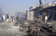 The Taliban fly their flag in Kunduz as exhausted Afghan troops regroup.