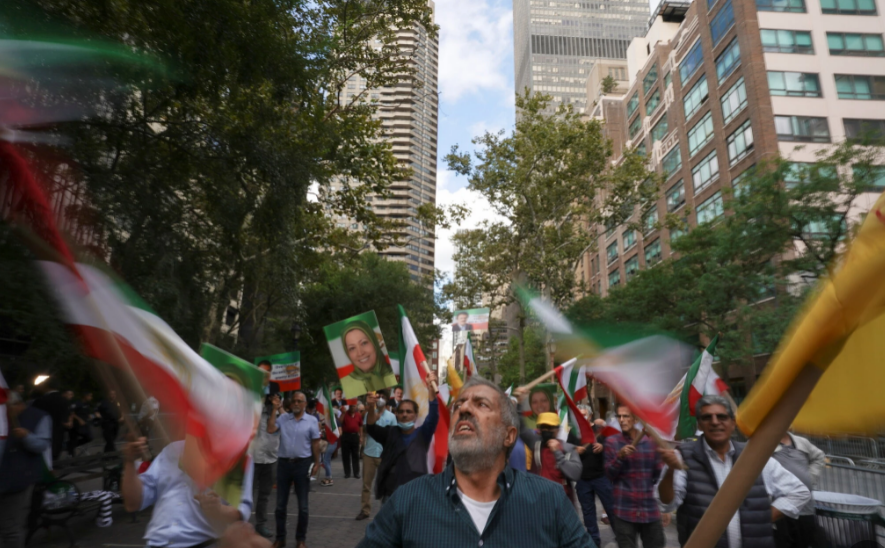 Protesters denounce the leaders of Brazil and Iran.