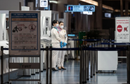 Japan bans all foreign travelers, and Australia delays its reopening.