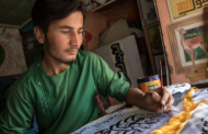 Business is good for Afghan artists — as long as they’re happy to paint Taliban flags and stamps