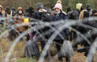 Belarus border crisis escalates with tear gas and water cannon fired at migrants